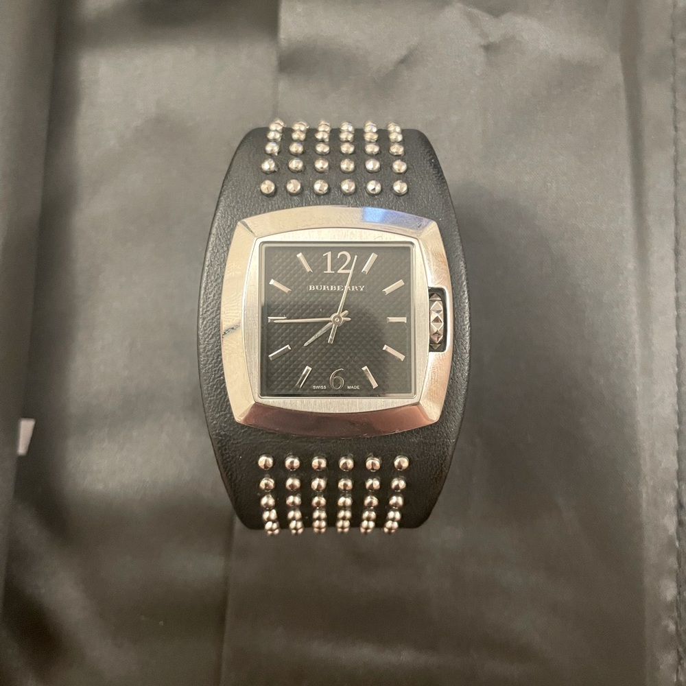 Burberry leather and stainless steel bracelet watch.